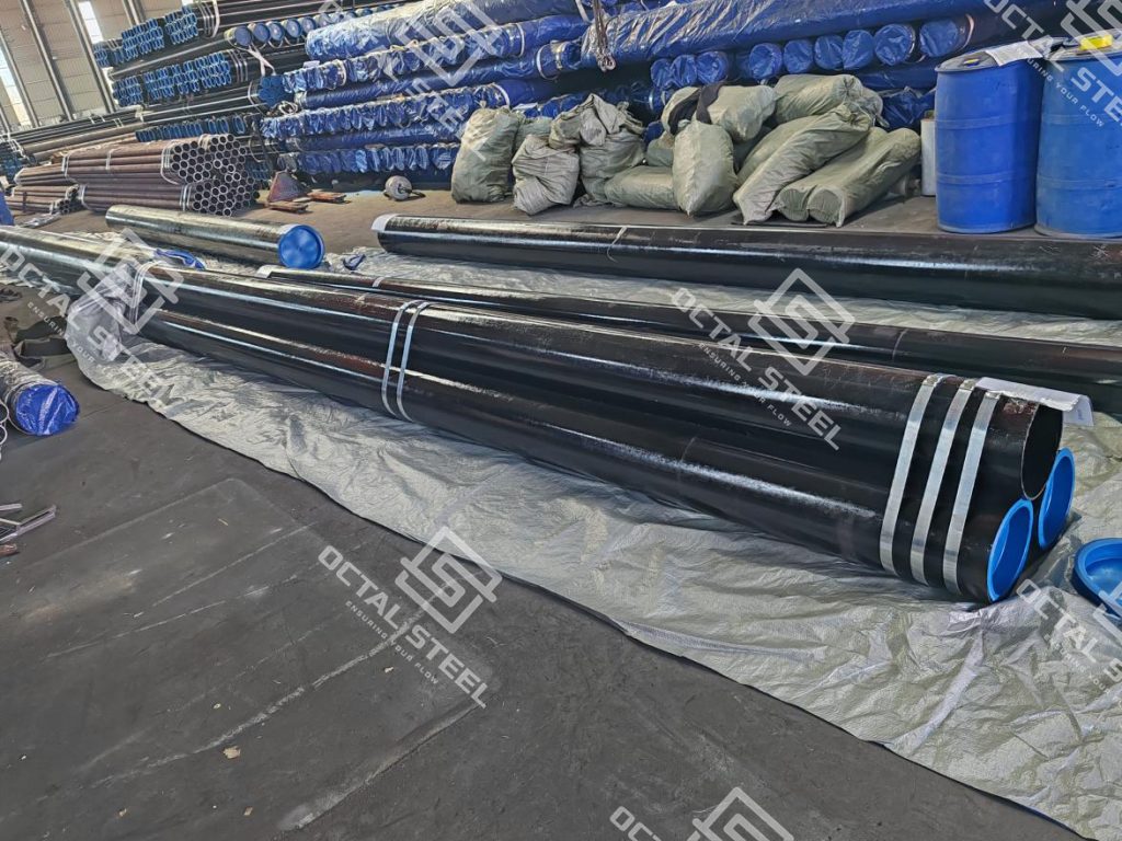 API 5L B carbon steel seamless pipes with black coating and end caps by OCTAL STEEL